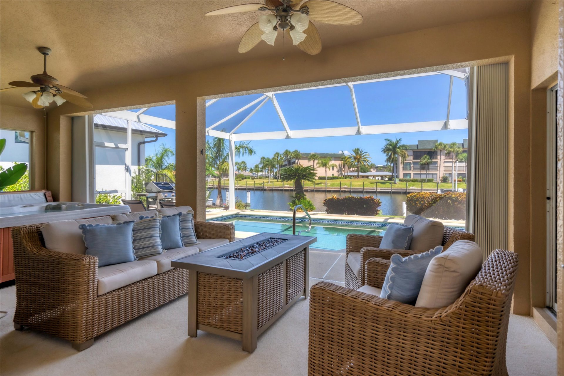 Lots of outdoor living space. Overlooking pool & canal