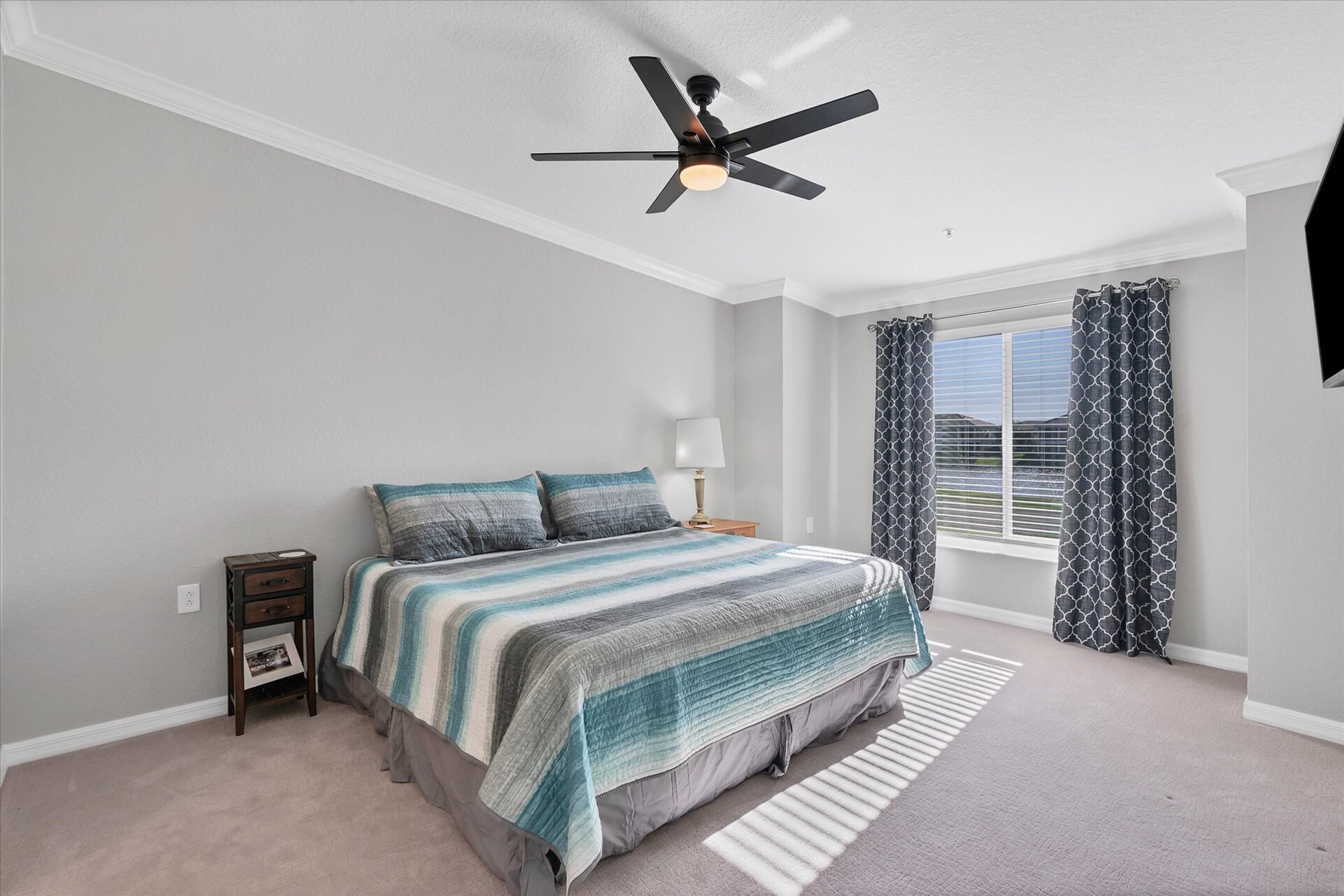 Primary bedroom has a king bed