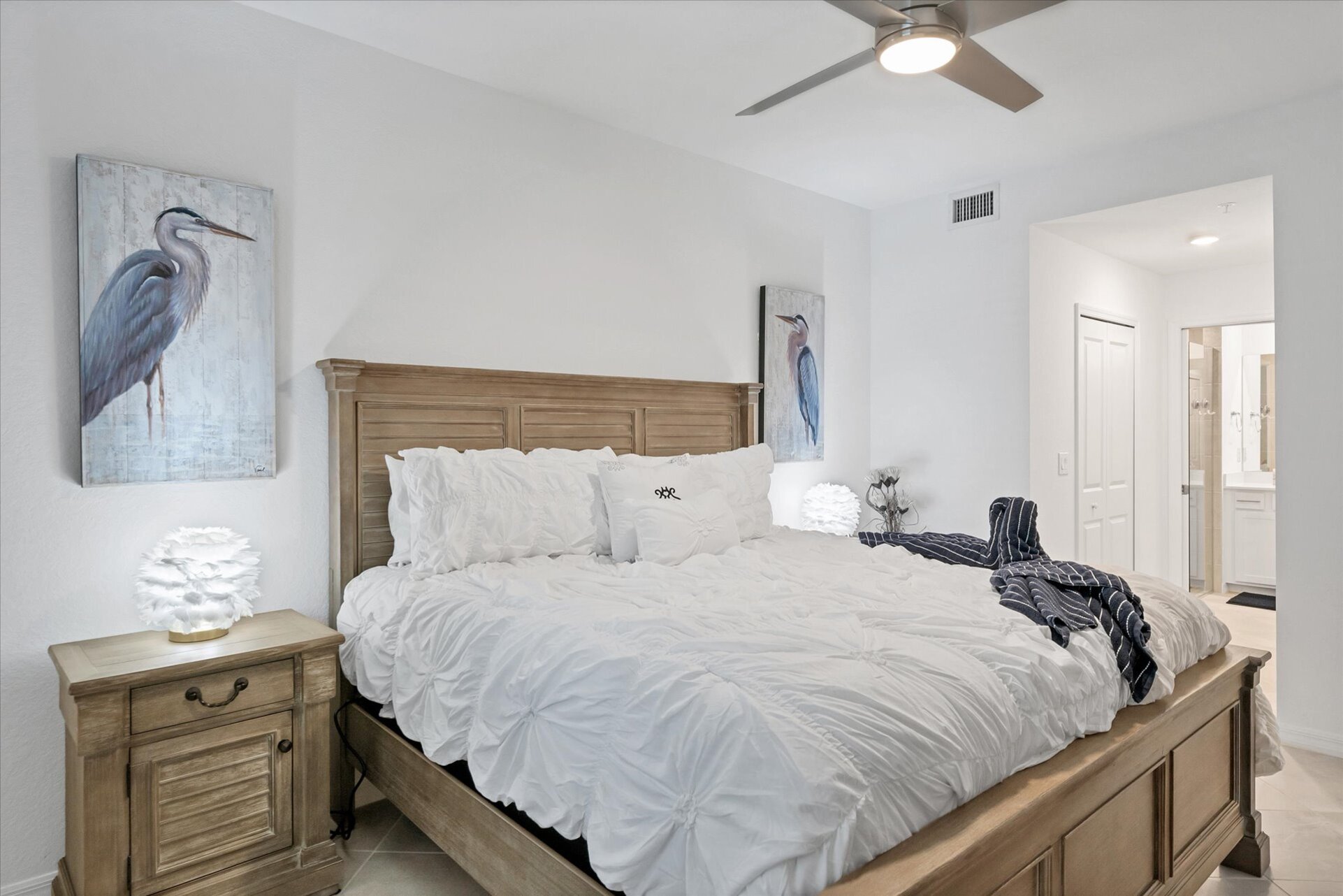 Primary bedroom with 55" Smart TV & ensuite
