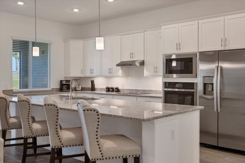 Gorgeous, fully-equipped kitchen with all new stainless steel appliances and large kitchen island that seats 4