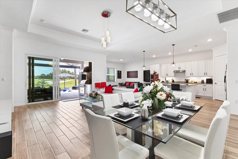 Beautiful, bright, open living space. Dining table seats 6