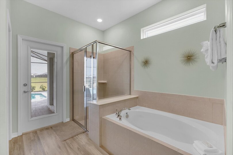 Master Suite 1, Shower and Tub, Downstairs, Door to Pool Deck