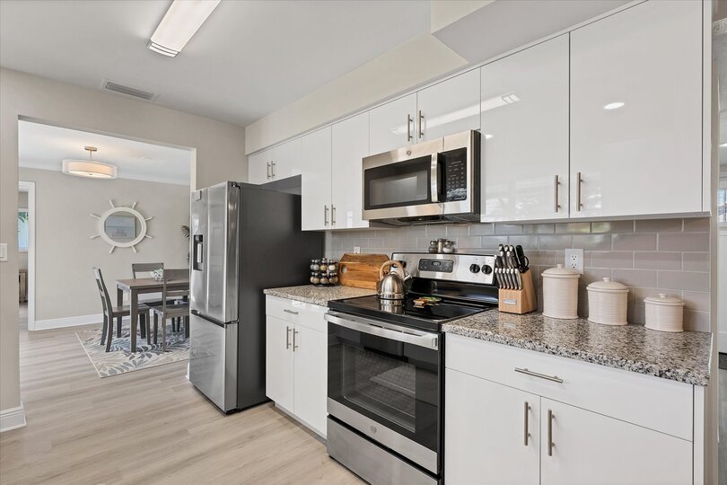 Beautiful, fully-equipped kitchen with stainless-steel appliances