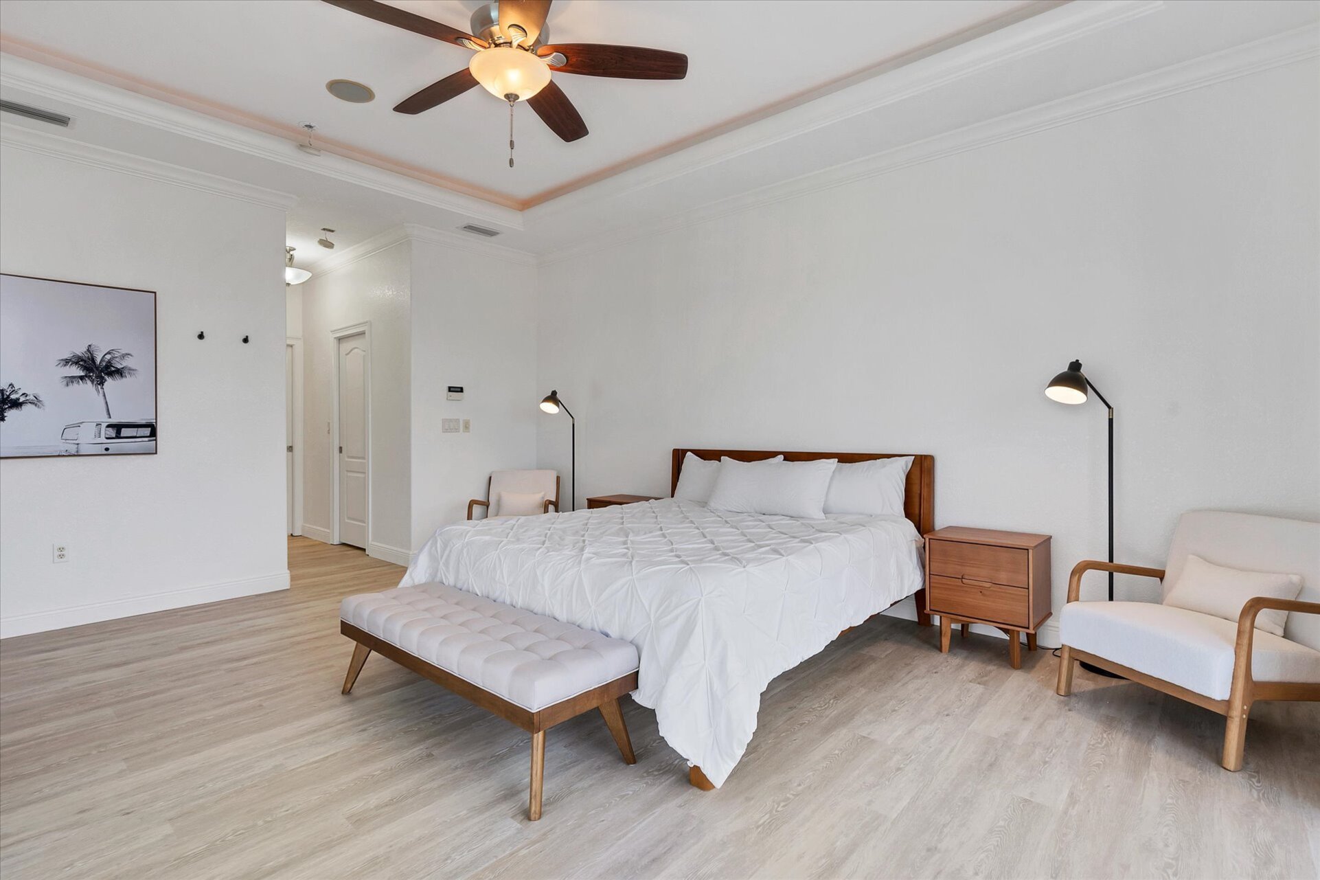 Primary Bedroom features king bed, ensuite, and lanai access