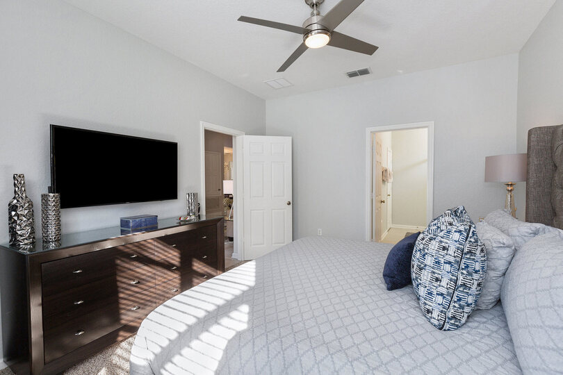 The master suite also features a 50-inch SMART TV