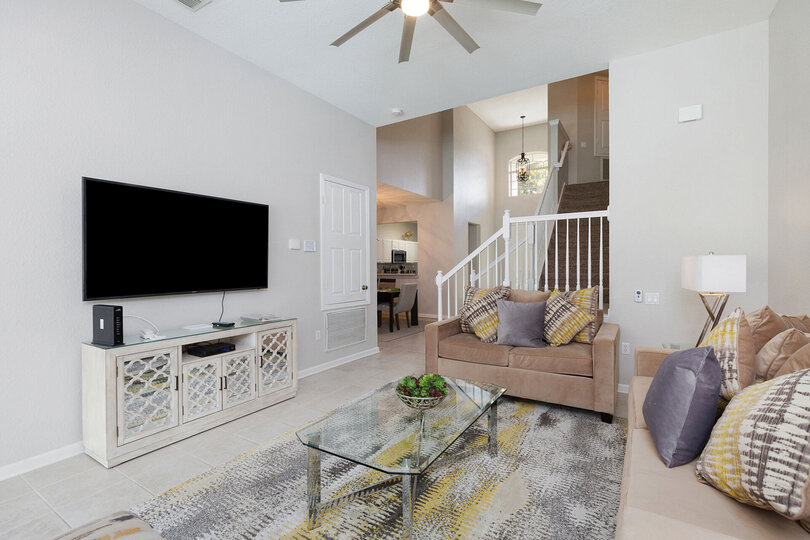 Sit back and relax after a long day in the theme parks in the spacious living area