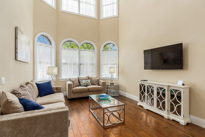Get comfortable on the spacious sofa while watching all of your favorite shows