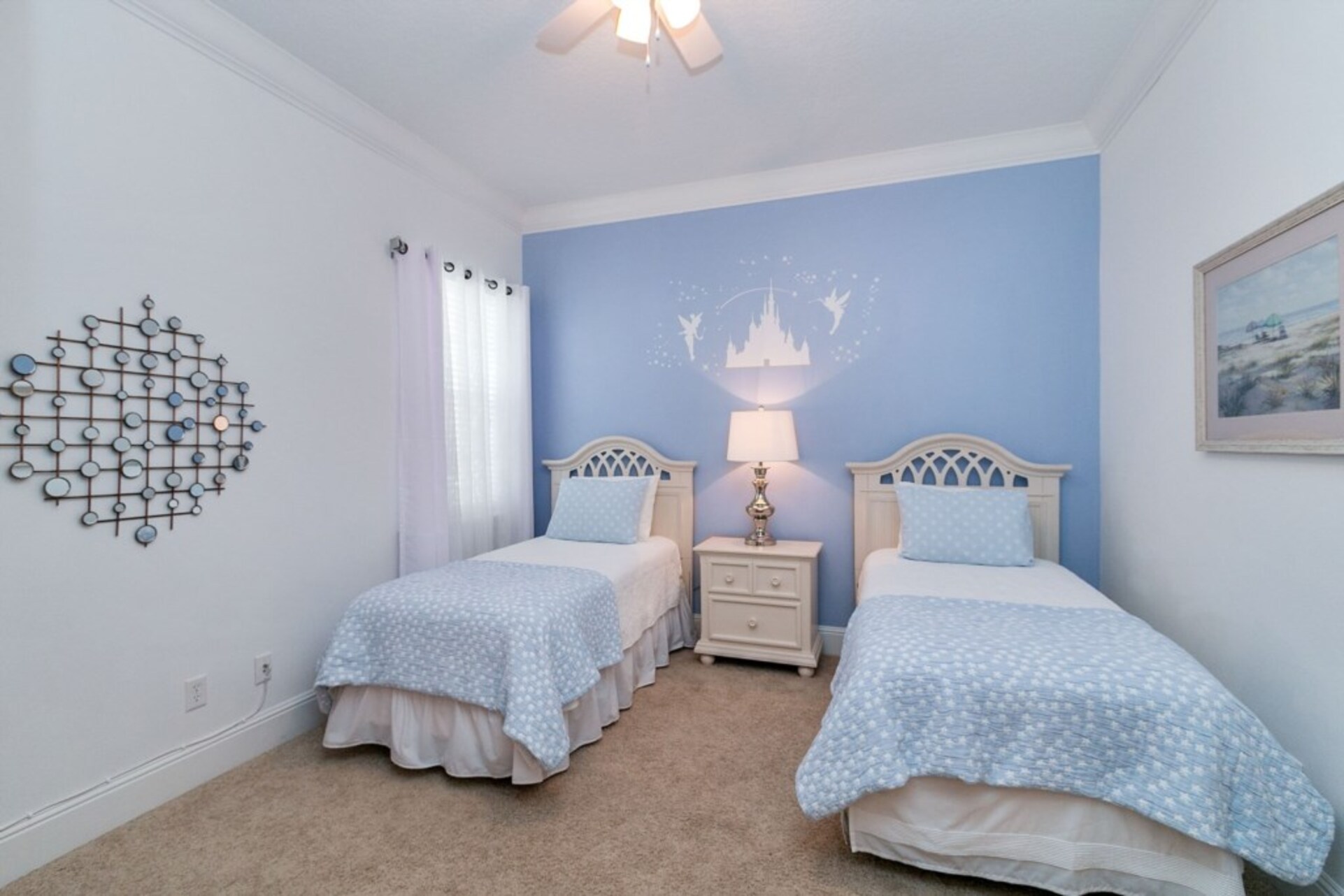 A lovely bedroom with twin beds on the first floor