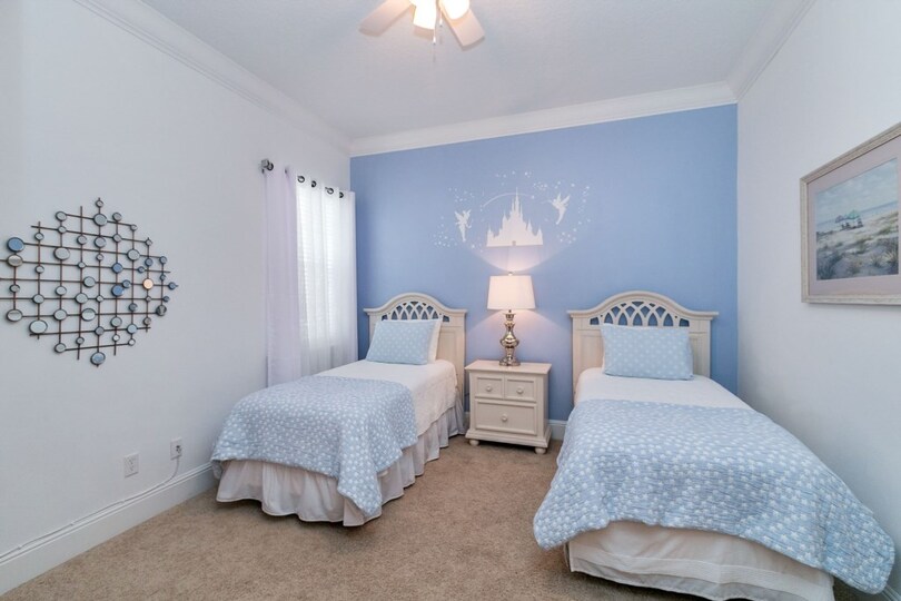 A lovely bedroom with twin beds on the first floor