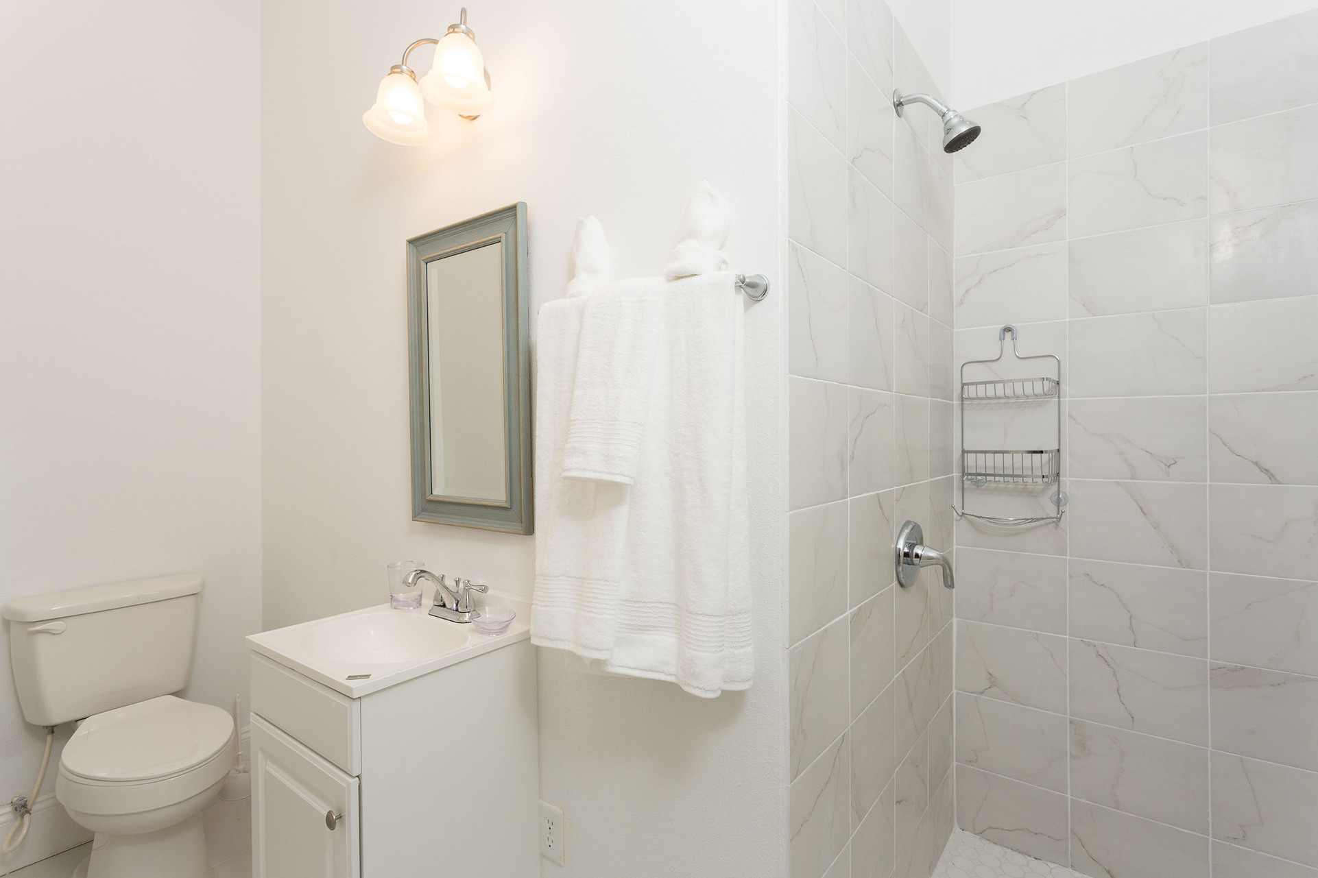This ensuite master bathroom has a beautiful walkin shower