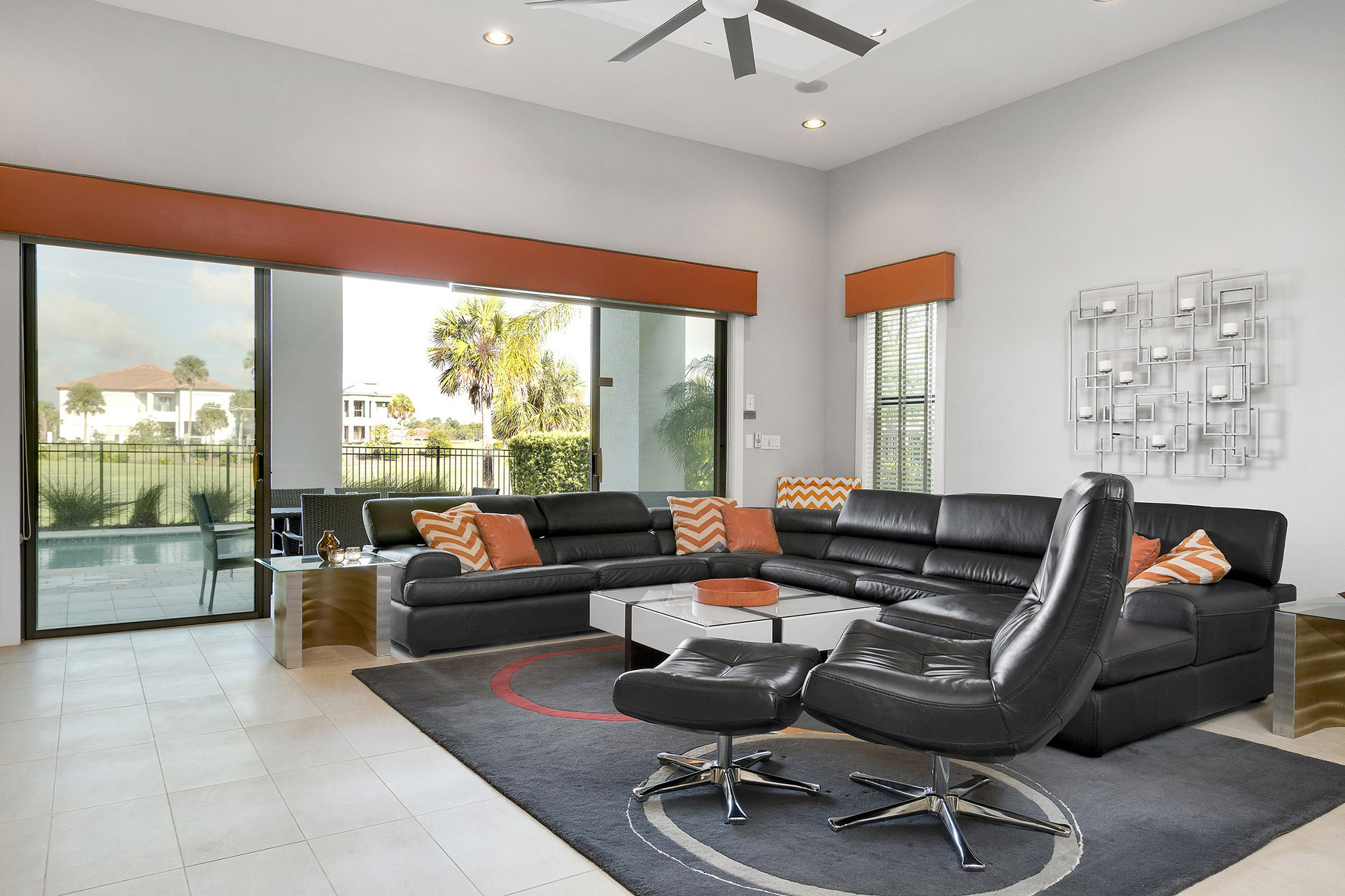 Enjoy the modern style living area with breathtaking views of the pool area