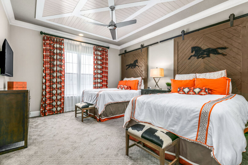 The Equestrian bedroom features two queen beds with an en-suite bathroom
