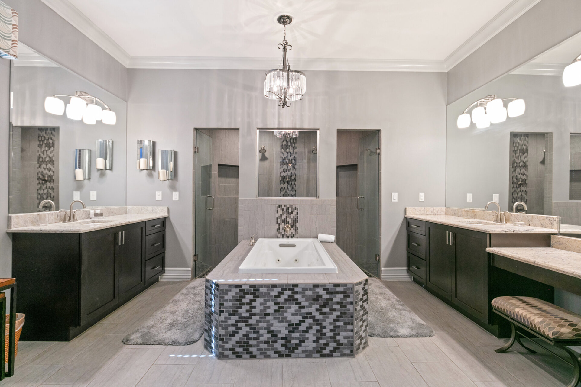 The master en-suite bathroom features a walk-in shower and jetted tub to relax