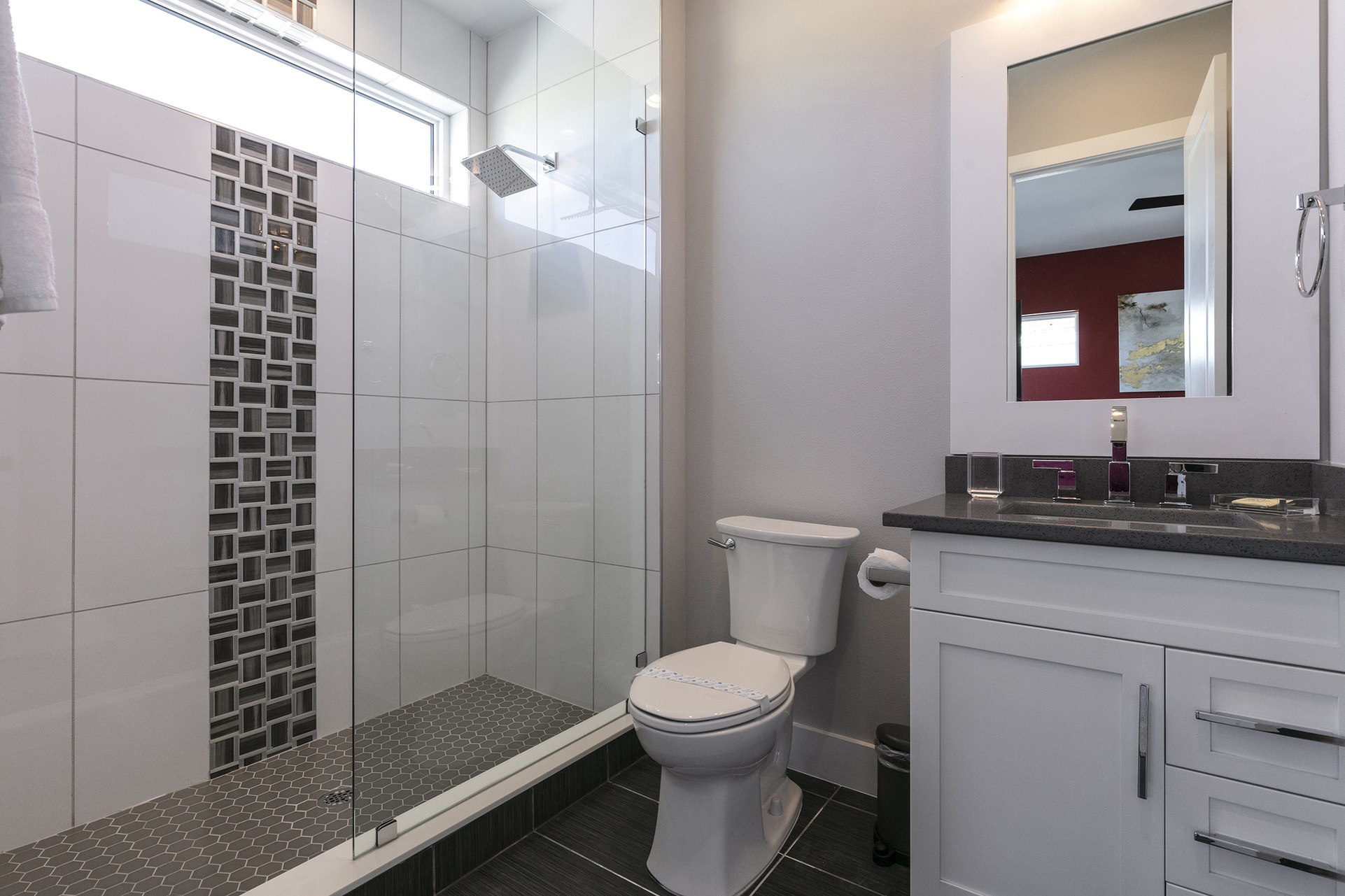 Ensuite bath with a walk-in rain water shower