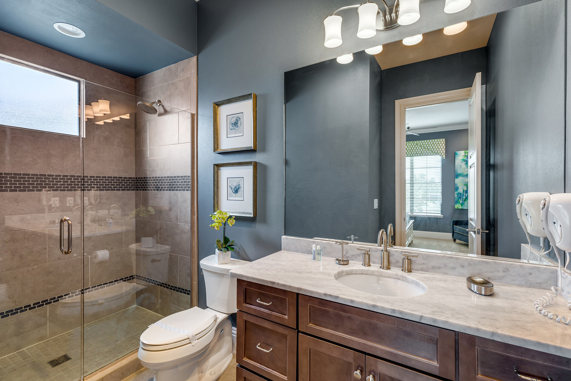 The ensuite bathroom with a large walk-in shower