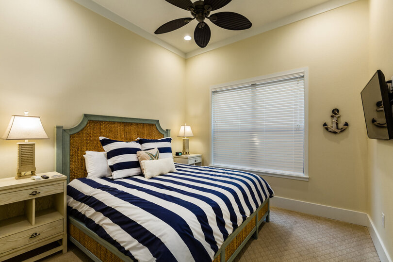 Downstairs nautical bedroom with a King bed