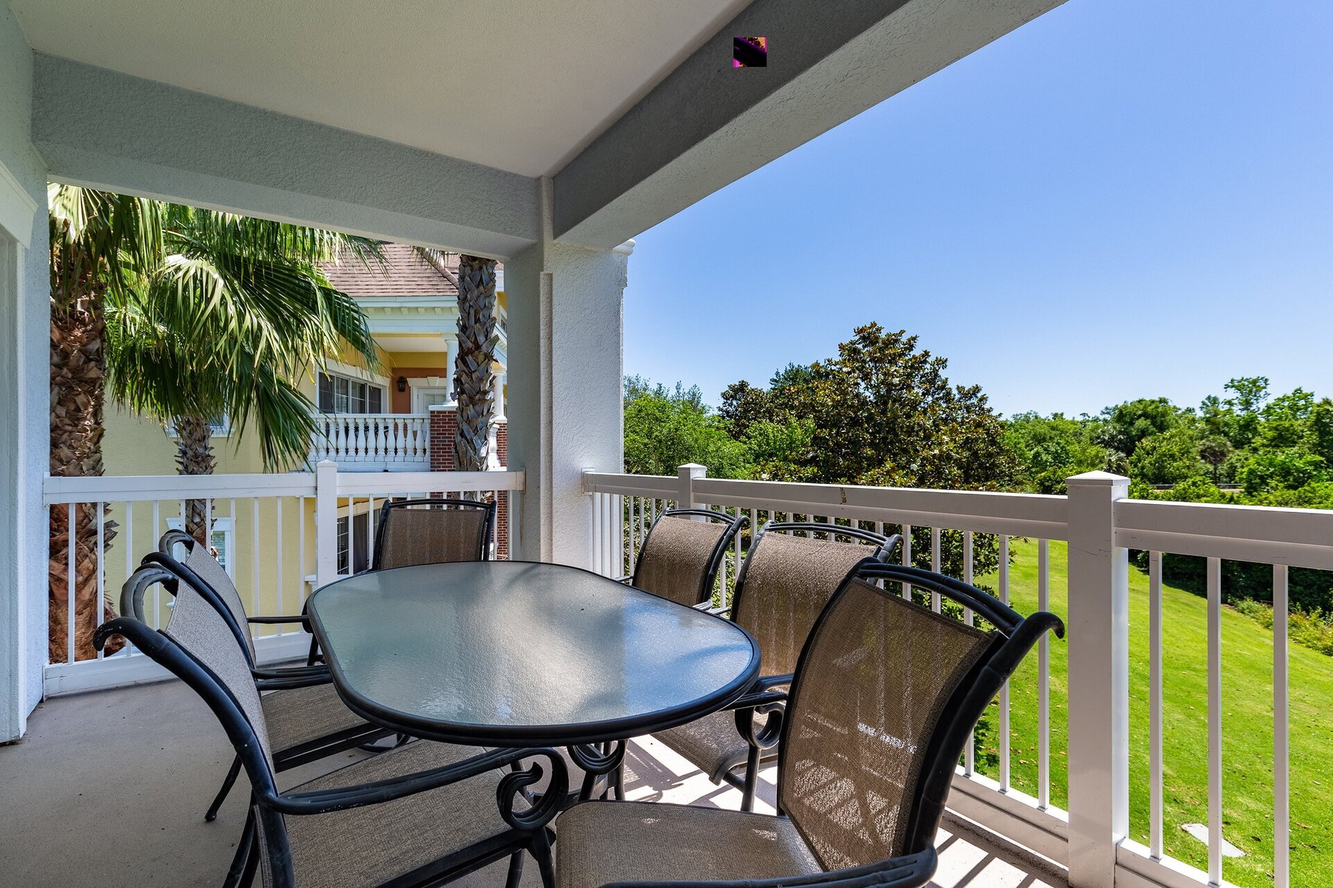 Enjoy a drink on the private balcony