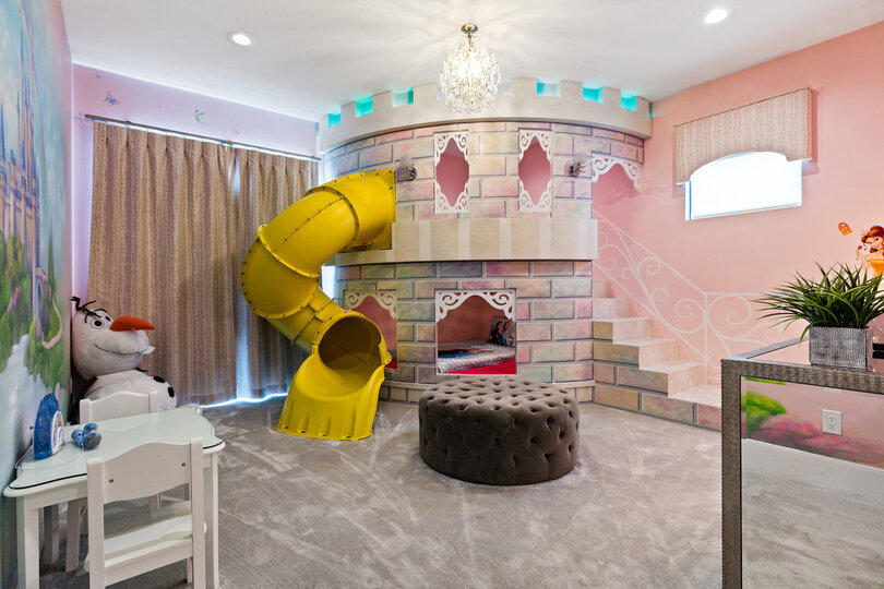 A bedroom fit for princesses, furnished with twin bed