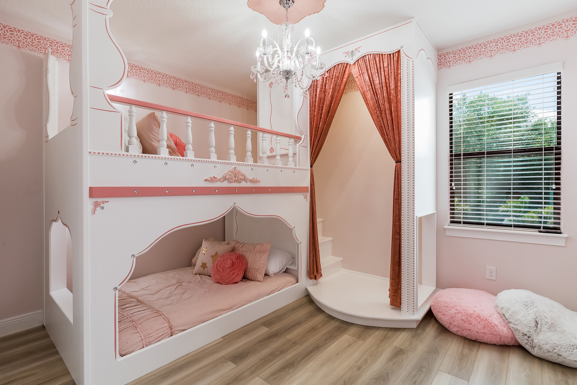 Princesses will enjoy their slumber in the Princess-themed bedroom furnished with two full-size bunked beds