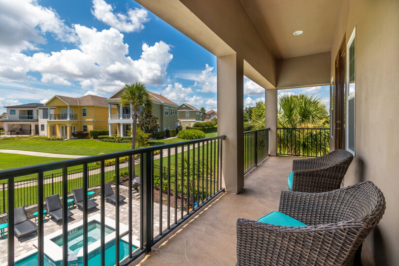 The master suite has access to a private balcony