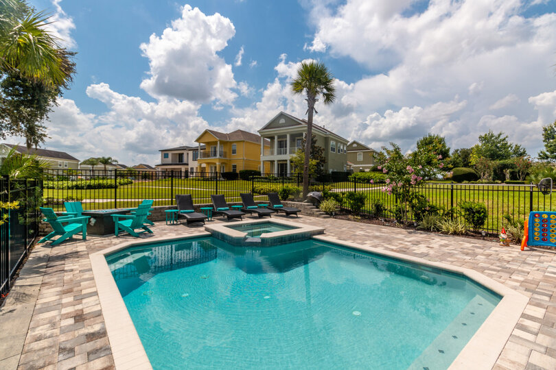 Soak up the Florida sun in the private pool with spillover spa