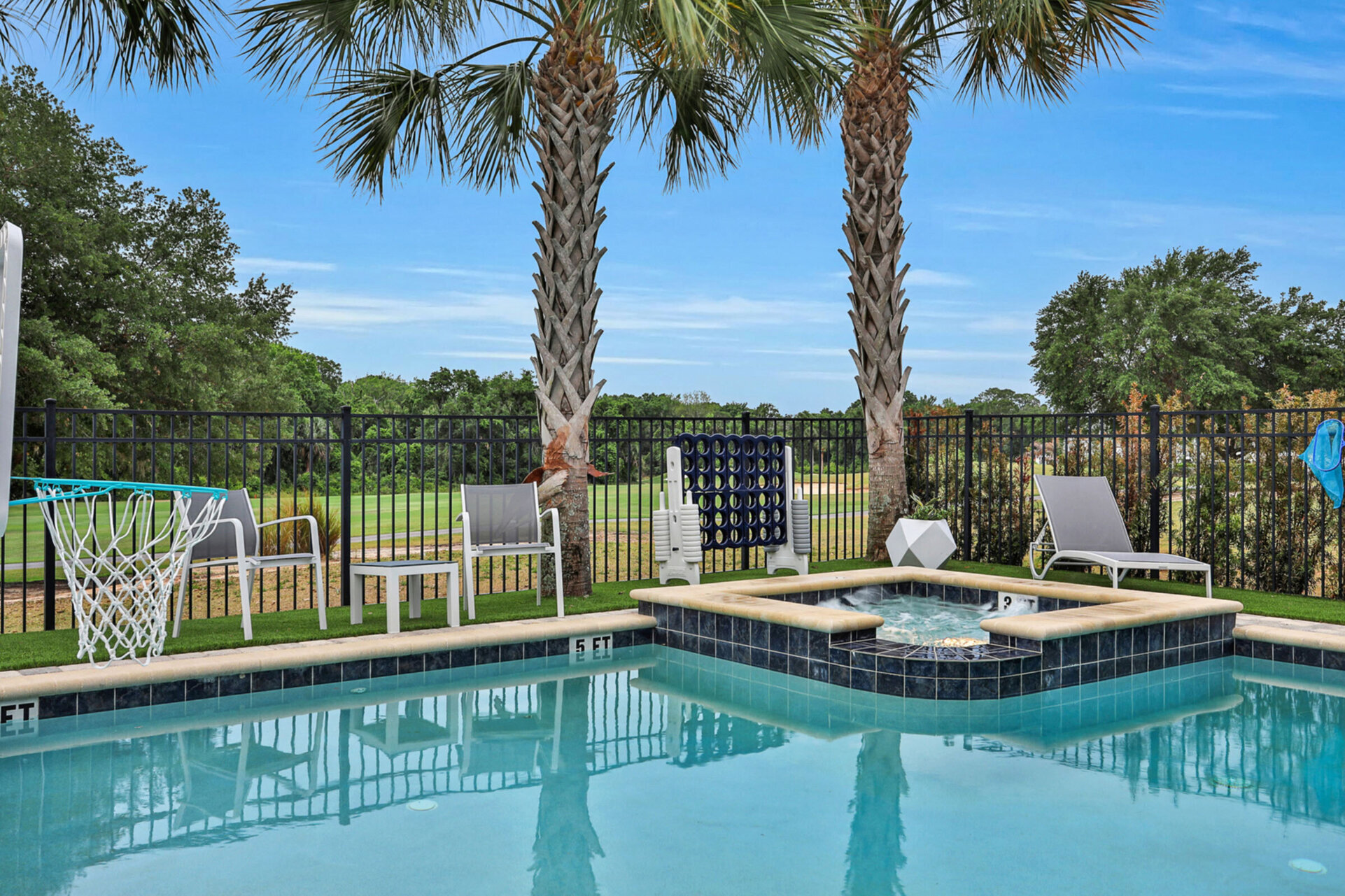 Take a dip in the pool with views of the golf course