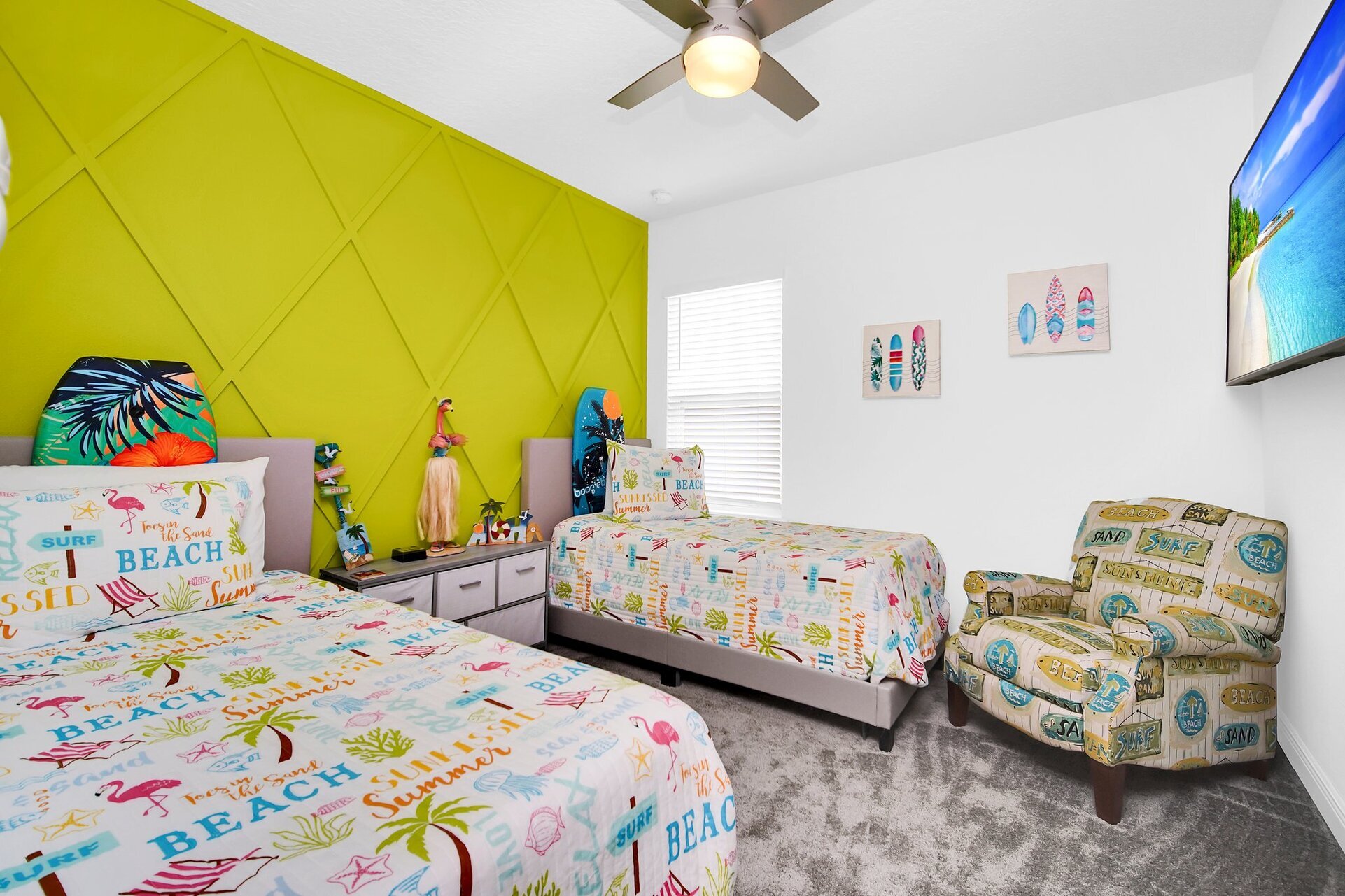 Surfs up! This beach themed room on the 2nd floor features 2 twin beds and a playstation!