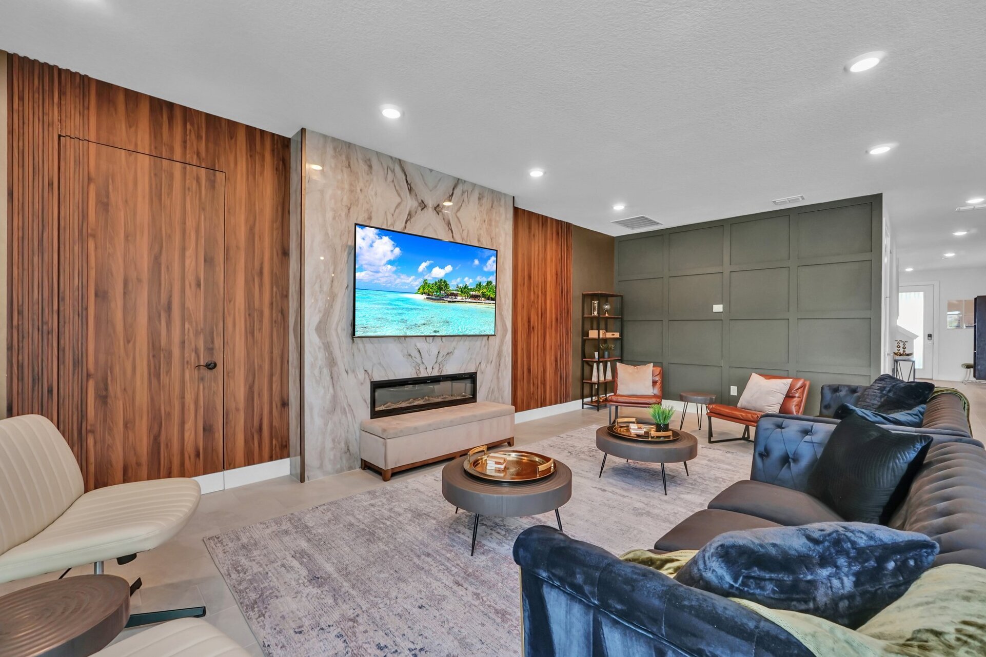 Gather in the spacious living room, designed with comfort in mind and ideal for entertaining guests or enjoying family time
