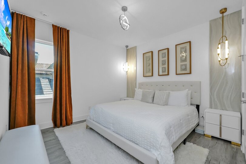 Rest easy after a long day in this plush King bed, offering the ultimate in comfort and relaxation