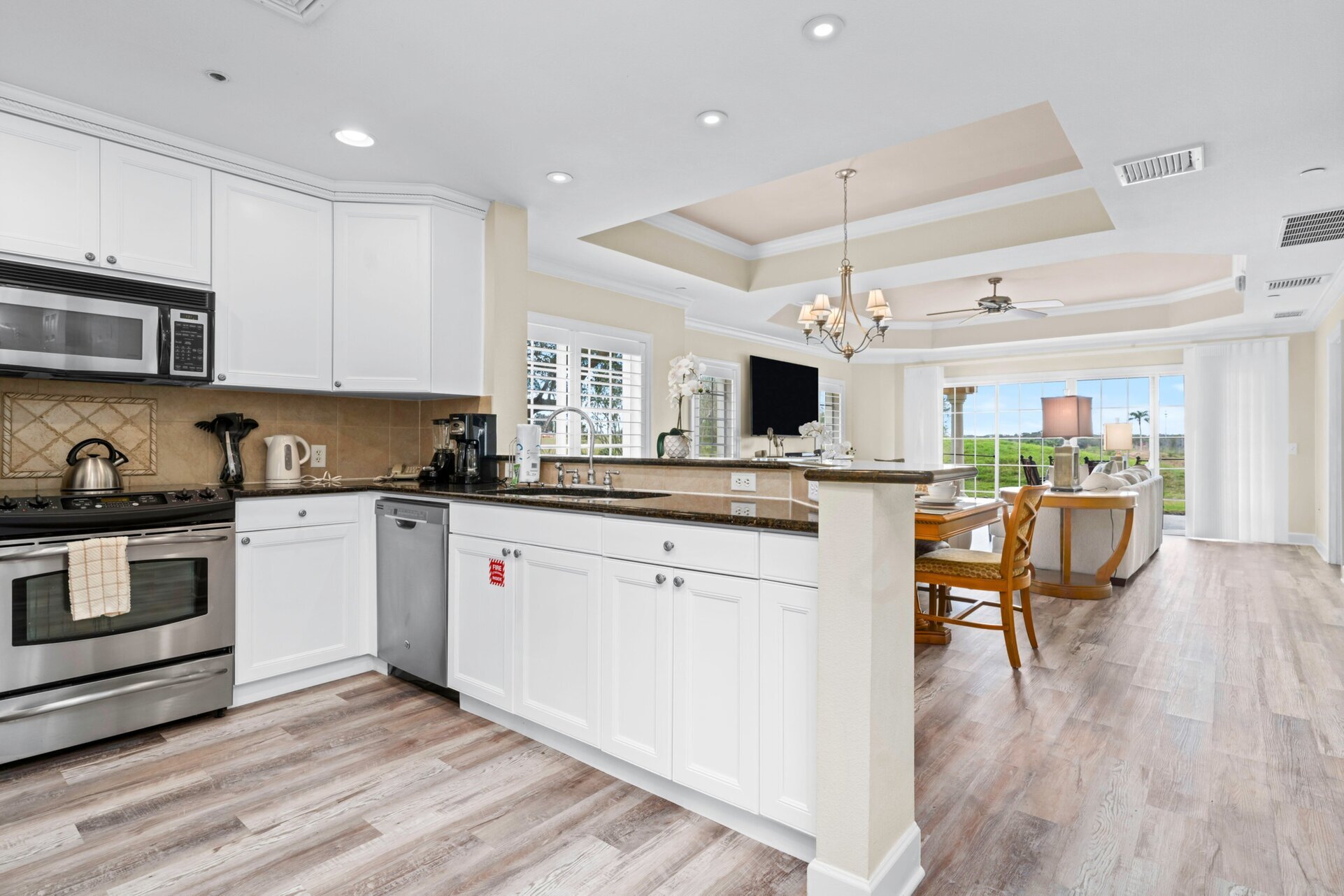 This property offers a blend of peaceful seclusion and contemporary elegance, all while being just moments away from a host of premier amenities and attractions