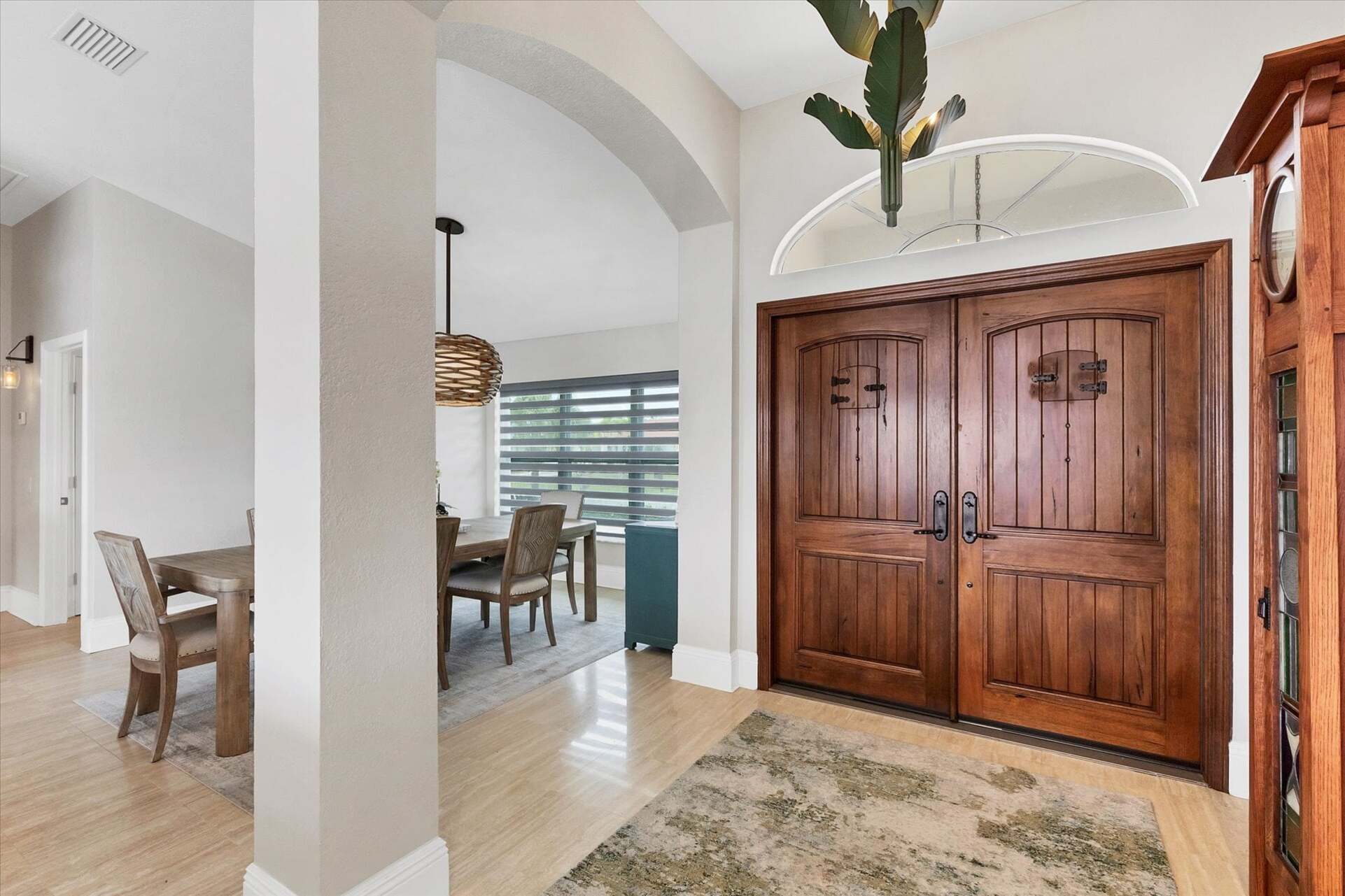 Foyer with gorgeous, custom -made doors