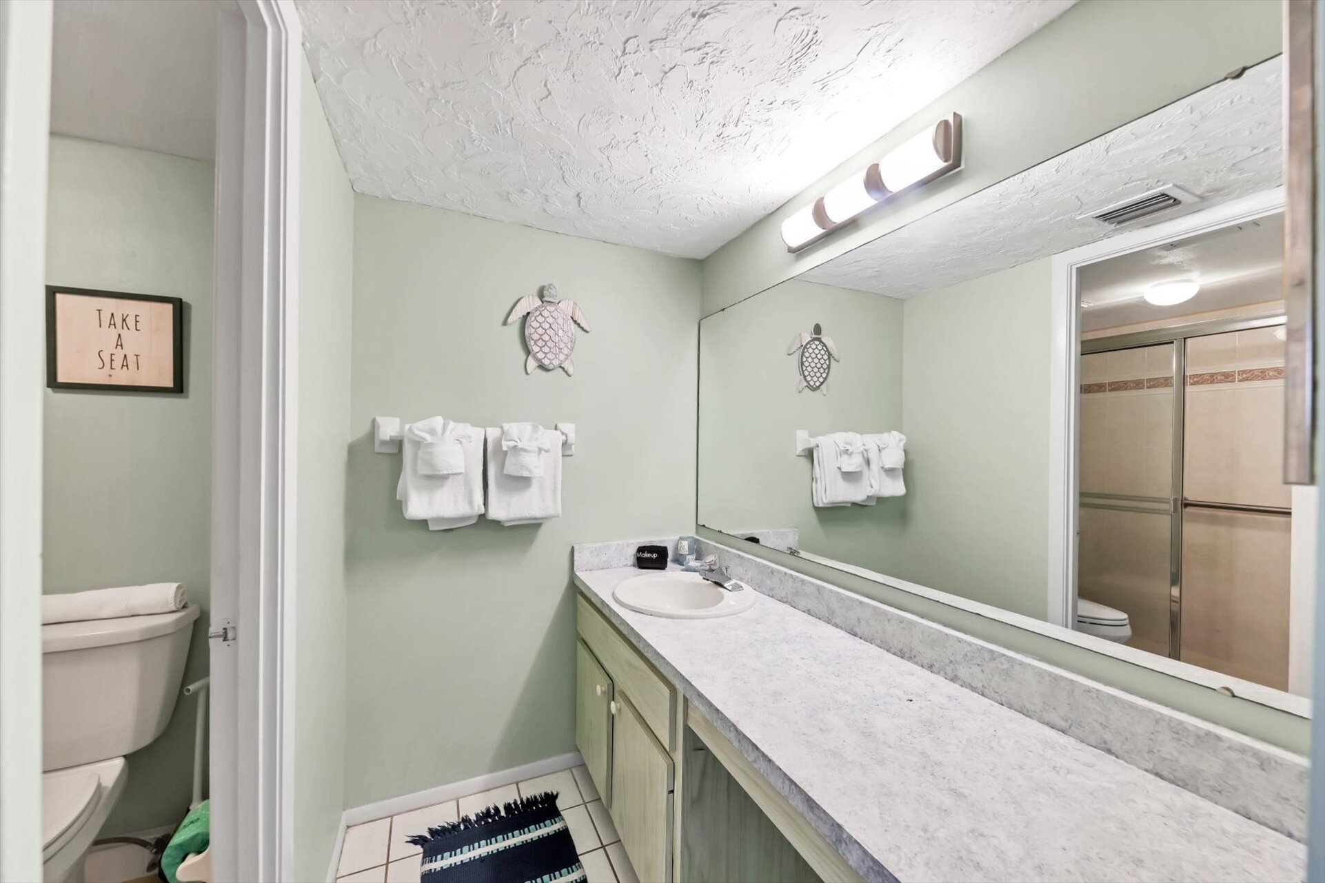 Primary en suite with a large walk-shower