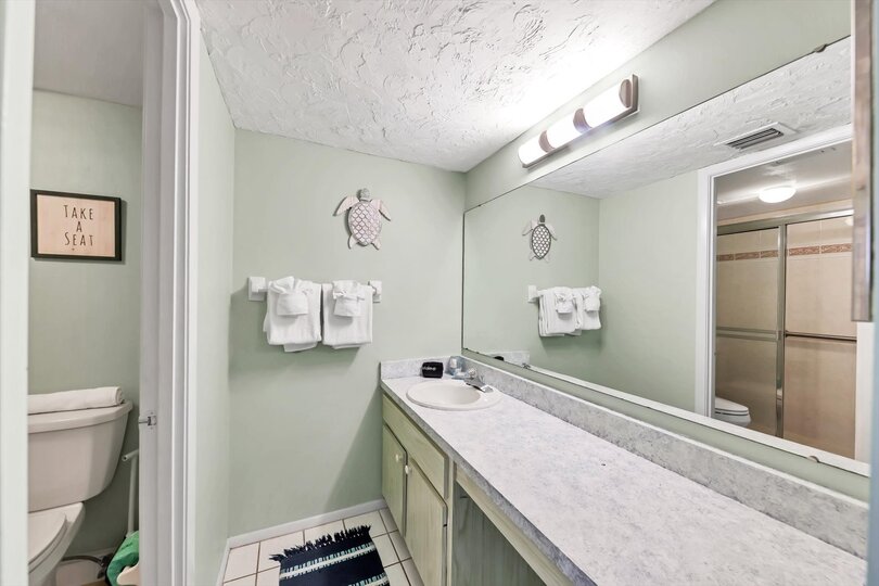 Primary en suite with a large walk-shower