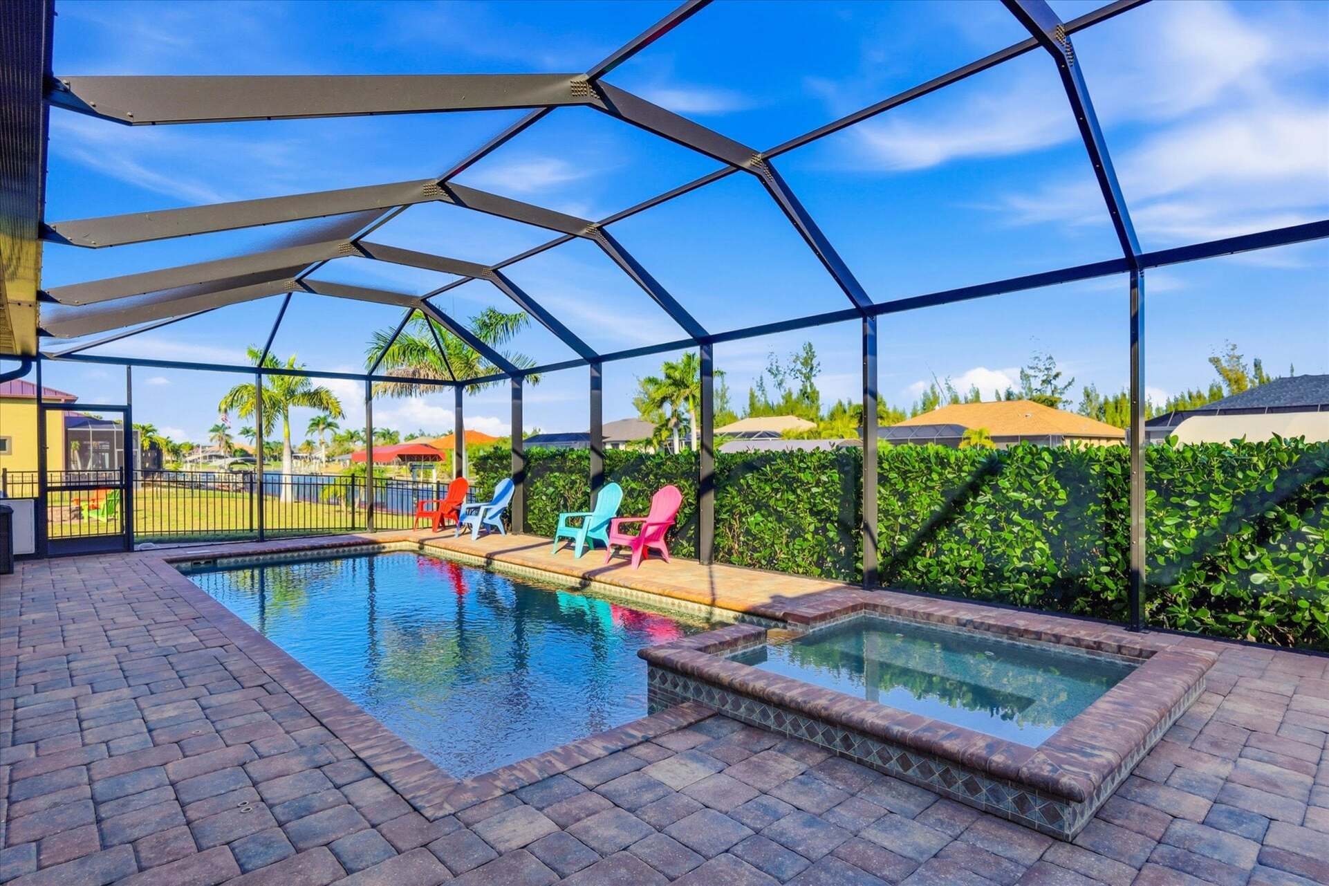 Sparkling saltwater pool & spa overlooking the canal