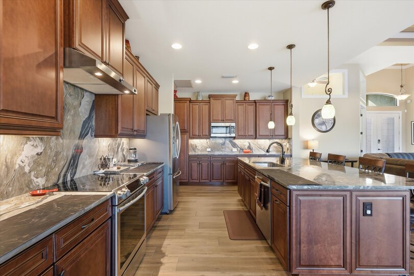 Beautiful, fully-equipped kitchen overlooking the living room and dining area