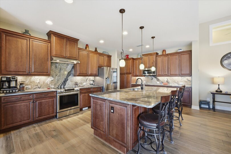 Beautiful, fully-equipped kitchen overlooking the living room and dining area