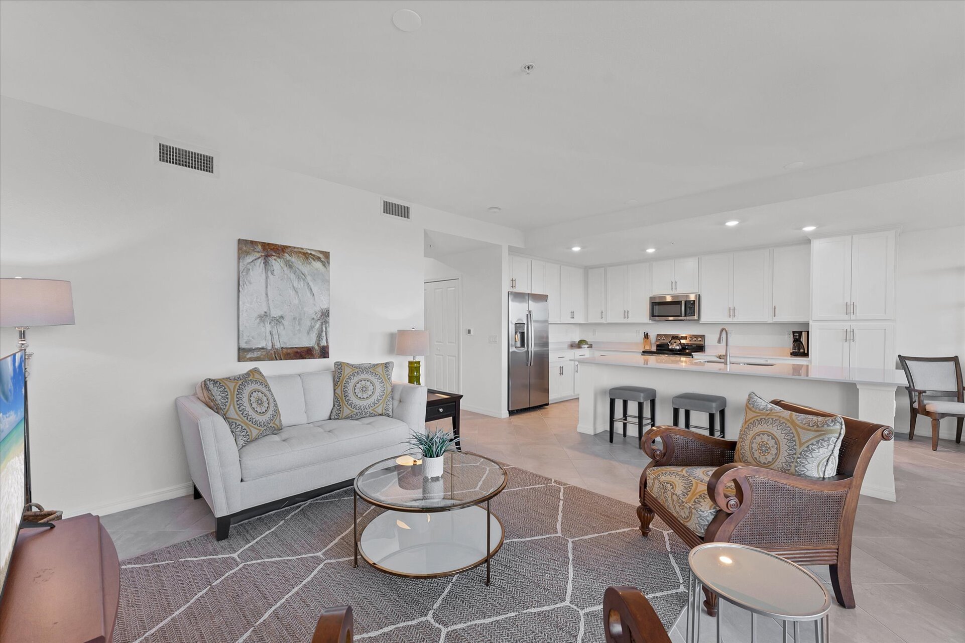 Bright, open living space with view of nature preserve