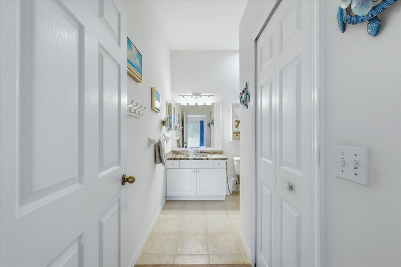 Primary attached bathroom with walk-in shower