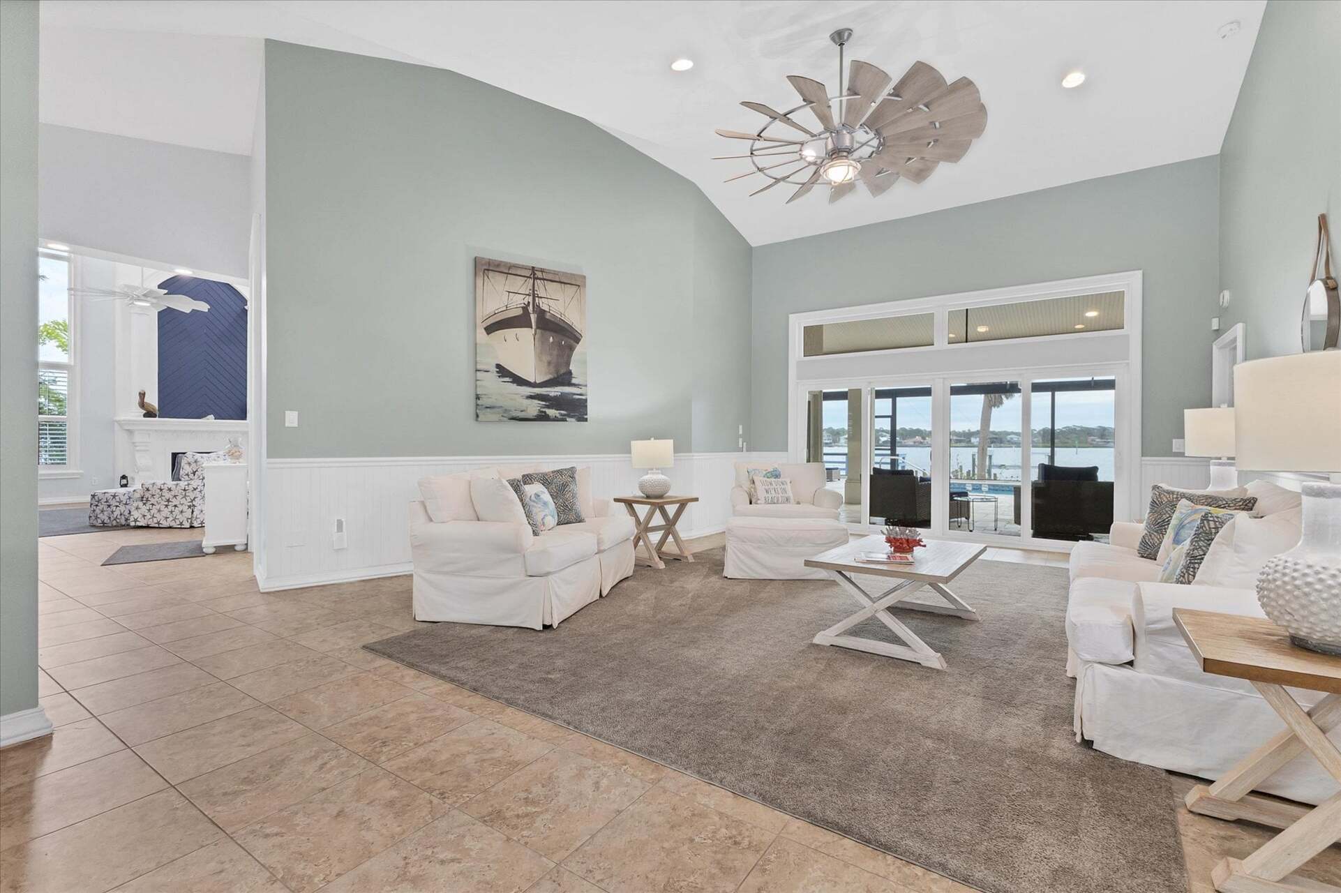 Living room overlooking the sparkling pool