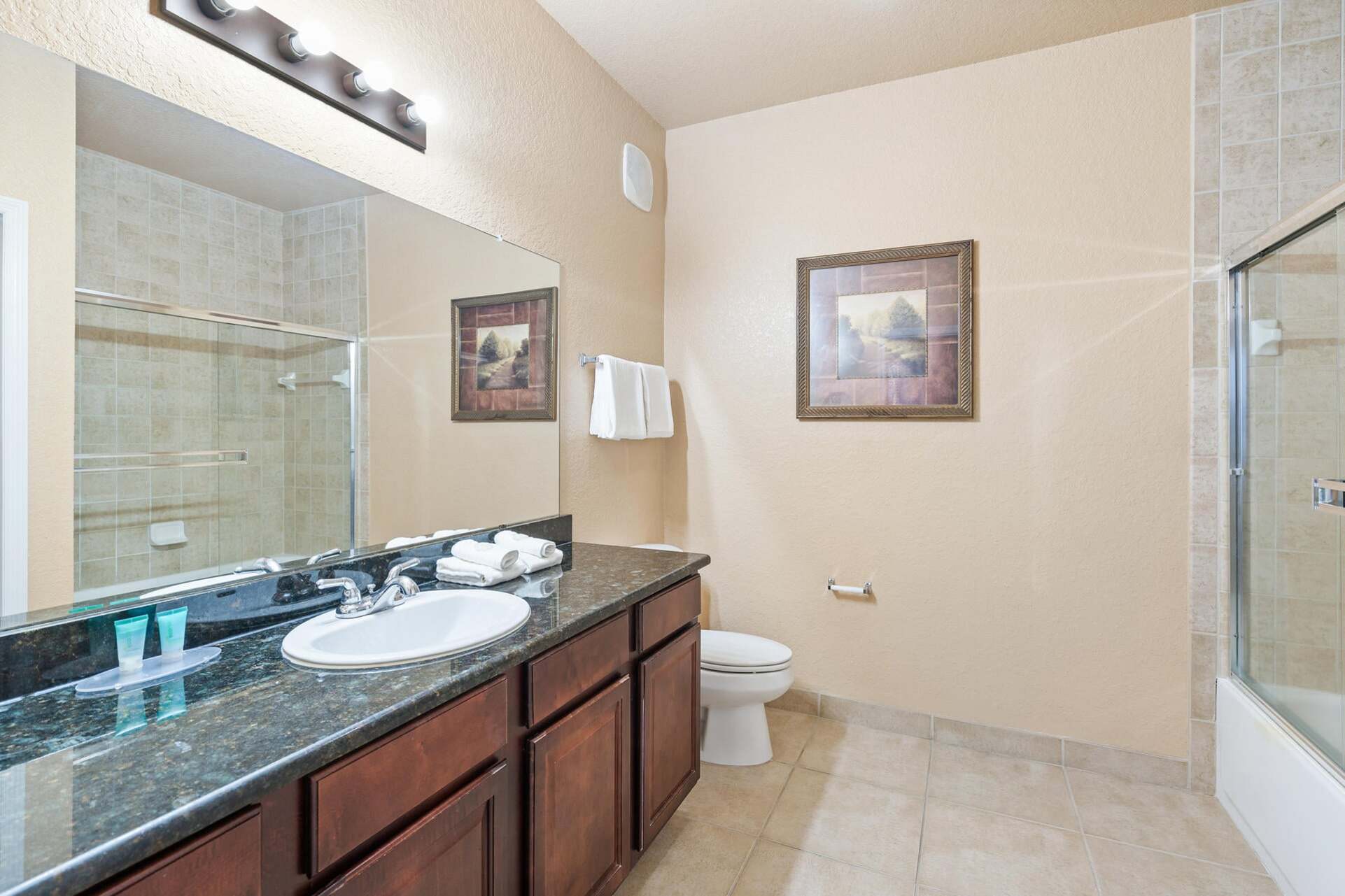 Shared Bathroom 2 Tub/Shower Combo