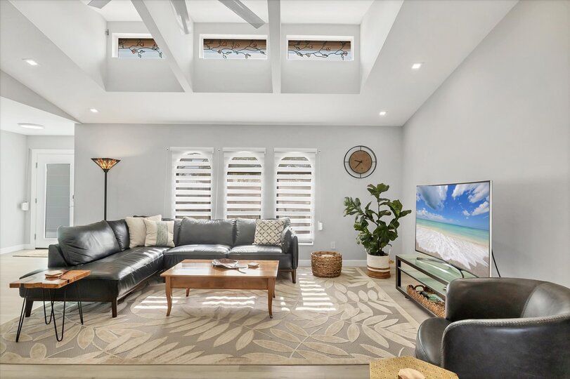 Large, Open, and Bright Living Area with 65" Smart TV